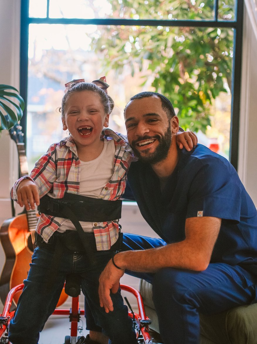 Home Nurse and Child with Cerebral Palsy 